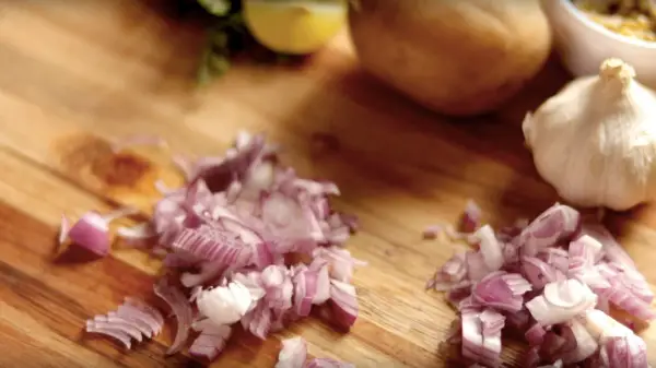 Chopped Onions on a chopping board
