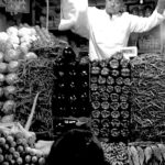 Indian vegetable seller selling vegetables in the market