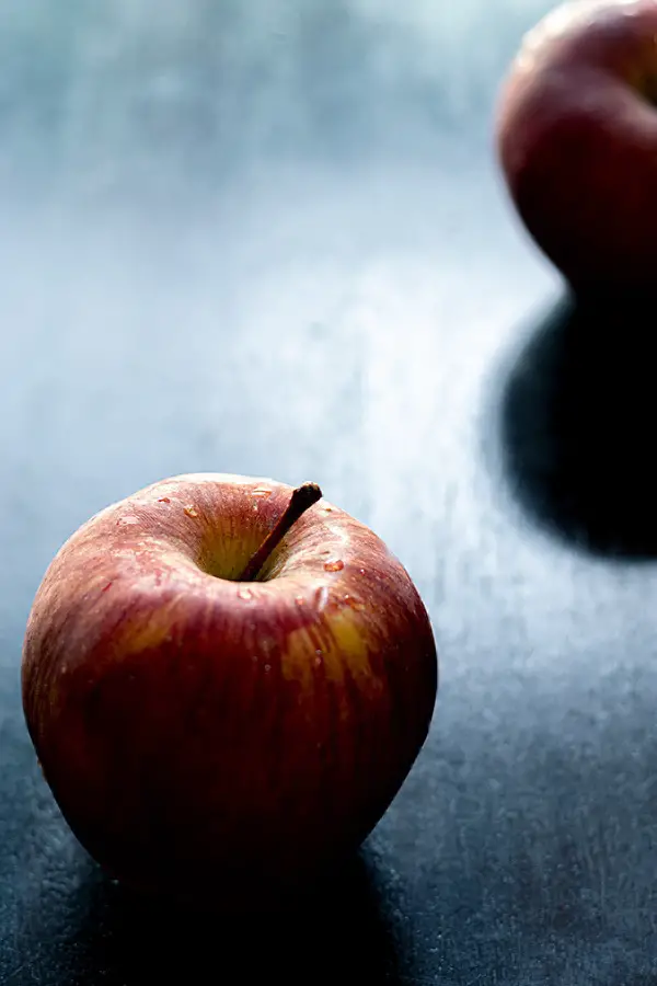 Red Delicious Apple on a wooden board