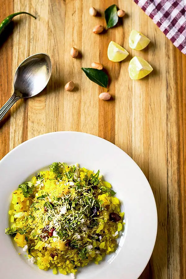 Kanda Poha is a traditional Maharashtrian breakfast snack, and you can make it at home using Flattened Rice, Onions, and Chillies.