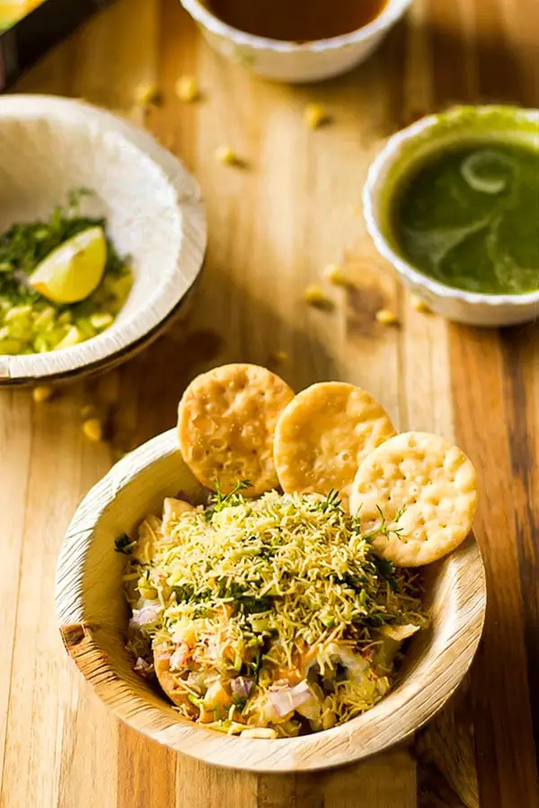 Papdi Chaat in a katori served with chutneys